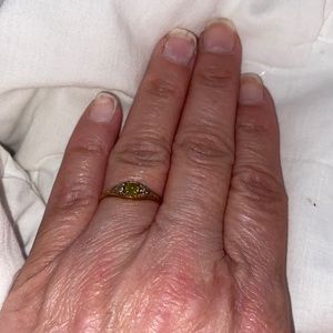 Peridot birth stone ring with two diamond baguettes - 14K gold band